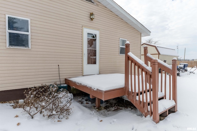 view of snow covered deck