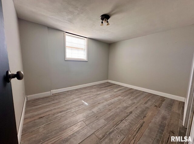 506 Timothy Ln, Carterville, IL 62918 - spare room with wood finished floors and baseboards