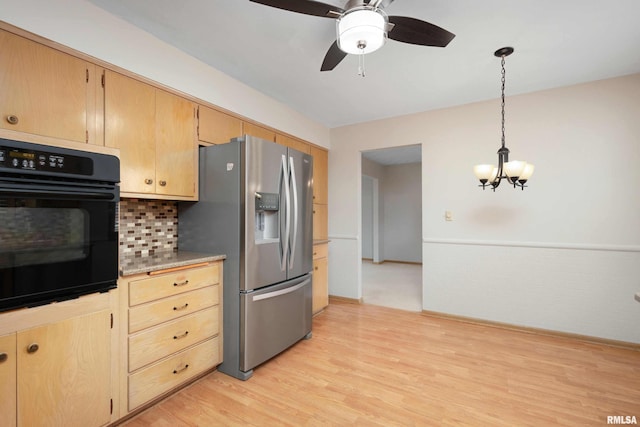 kitchen featuring light brown cabinets, oven, light wood-style floors, light countertops, and stainless steel refrigerator with ice dispenser