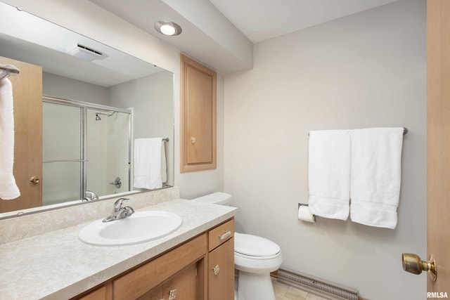 bathroom with toilet, a shower with shower door, vanity, and visible vents