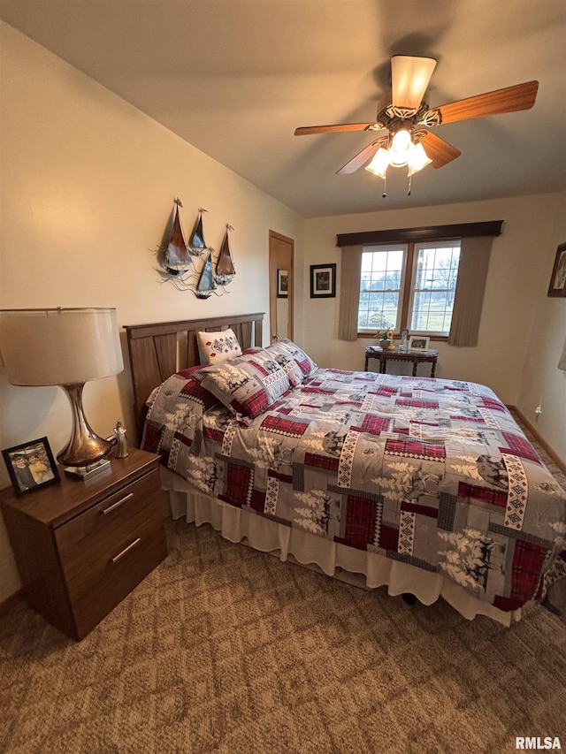 bedroom featuring carpet floors and a ceiling fan