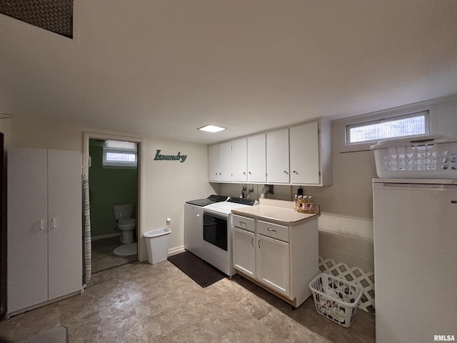 laundry room featuring laundry area and separate washer and dryer