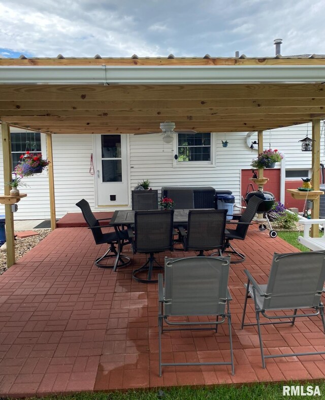 wooden deck featuring outdoor dining area