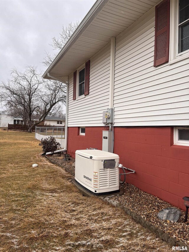 view of side of property featuring a lawn