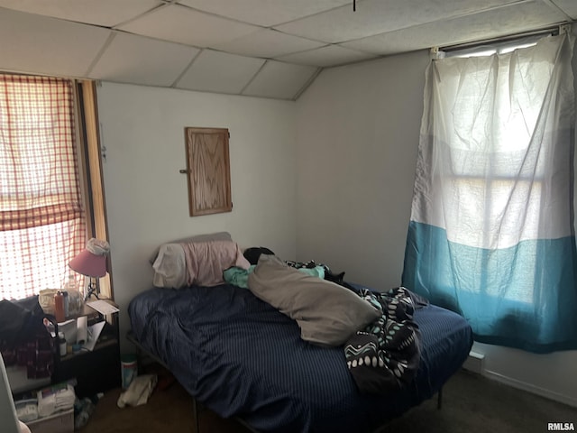 bedroom with a drop ceiling