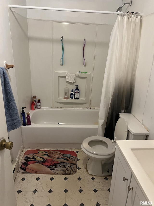 full bathroom with a baseboard radiator, toilet, shower / bath combo, vanity, and tile patterned floors