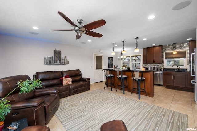 living room with recessed lighting, ceiling fan, and light tile patterned flooring