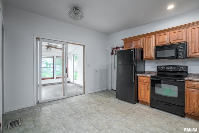 kitchen with recessed lighting, visible vents, brown cabinetry, black appliances, and baseboards