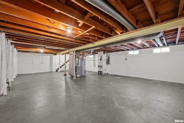 basement featuring heating unit