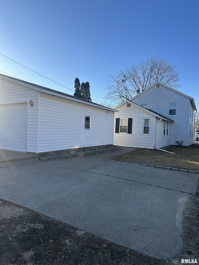 exterior space featuring a garage