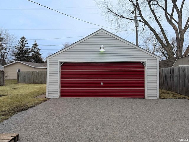 detached garage with fence