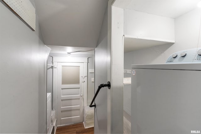 stairs featuring washer / clothes dryer and wood finished floors