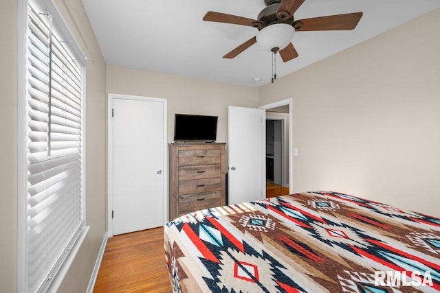 bedroom featuring ceiling fan and light wood-style floors