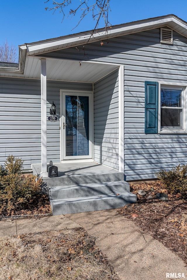 entrance to property featuring visible vents