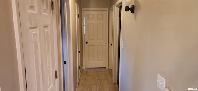 hall with wood finish floors