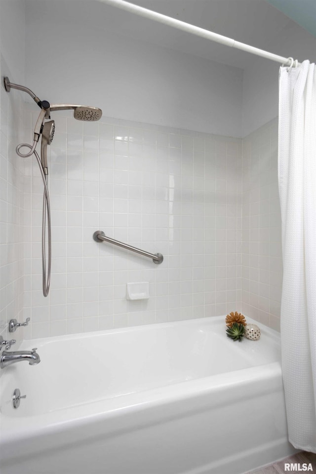 full bathroom with shower / bath combo with shower curtain