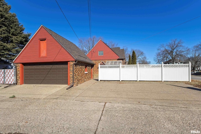 detached garage with fence