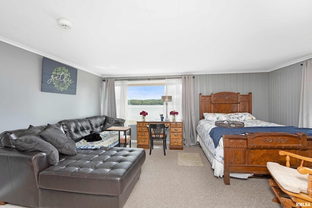 bedroom with carpet and crown molding