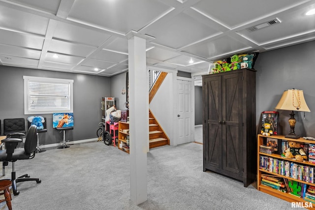 carpeted office space featuring baseboards, visible vents, and coffered ceiling