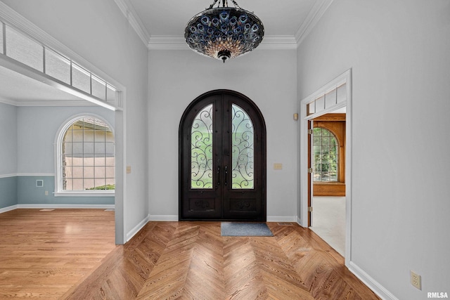 2 S Shore Ln, Rapids City, IL 61278 - entryway featuring arched walkways, ornamental molding, french doors, and a high ceiling