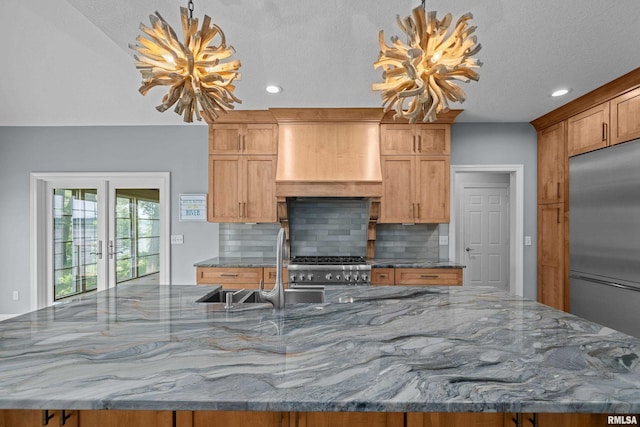 2 S Shore Ln, Rapids City, IL 61278 - kitchen featuring stainless steel appliances, backsplash, a large island with sink, light stone countertops, and recessed lighting