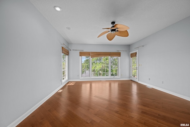 2 S Shore Ln, Rapids City, IL 61278 - unfurnished room featuring a ceiling fan, wood finished floors, a textured ceiling, healthy amount of natural light, and recessed lighting