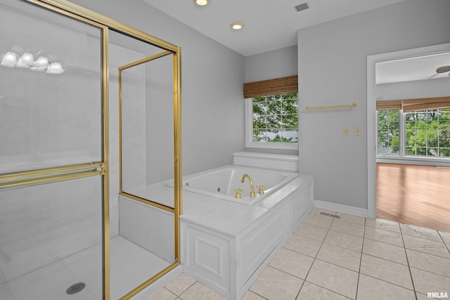 2 S Shore Ln, Rapids City, IL 61278 - full bathroom with a tub with jets, plenty of natural light, a stall shower, recessed lighting, and tile patterned floors