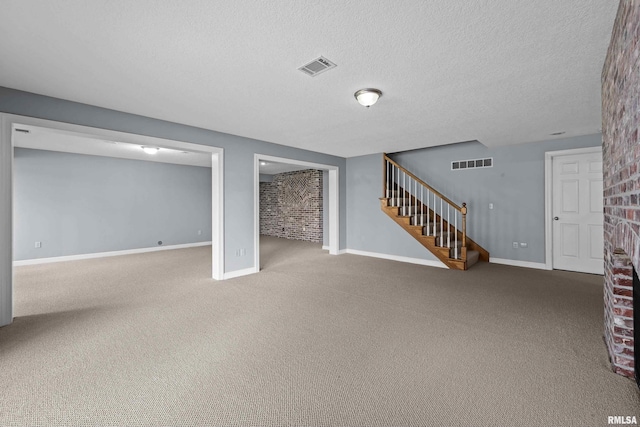 2 S Shore Ln, Rapids City, IL 61278 - finished basement with stairway, carpet, and a textured ceiling