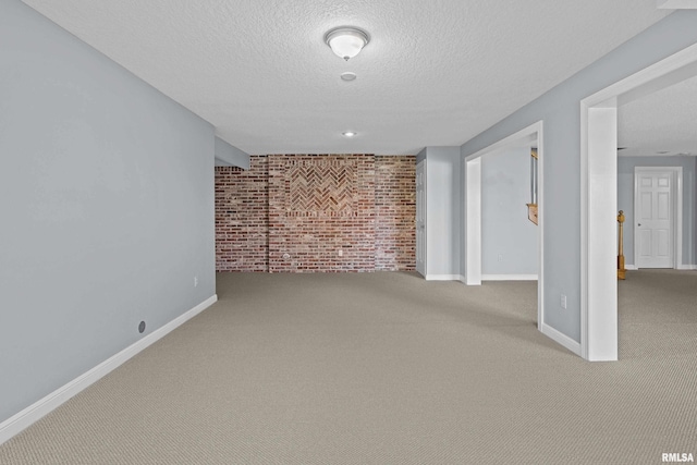 2 S Shore Ln, Rapids City, IL 61278 - carpeted spare room featuring brick wall and a textured ceiling
