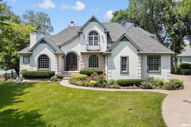 2 S Shore Ln, Rapids City, IL 61278 - french country home featuring stucco siding, a chimney, stone siding, and french doors