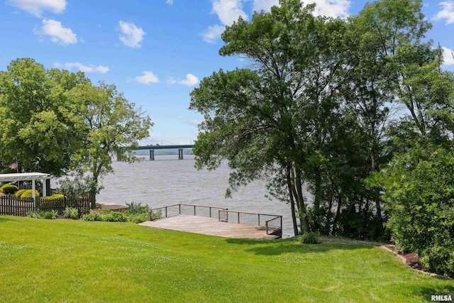 2 S Shore Ln, Rapids City, IL 61278 - view of green lawn with a water view and a dock