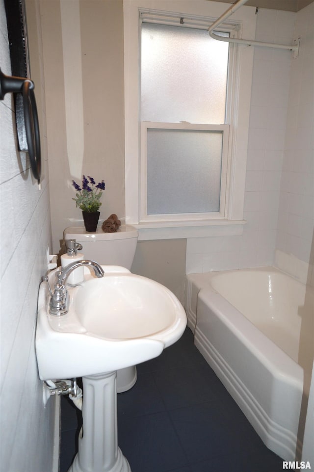 full bath with  shower combination and tile patterned floors