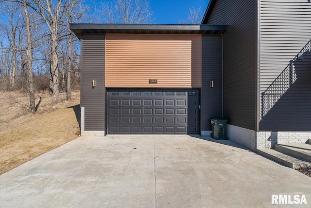 garage with driveway