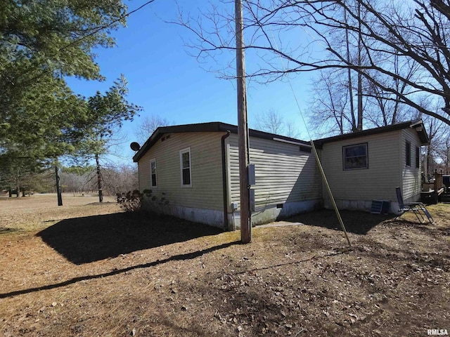 view of home's exterior featuring crawl space