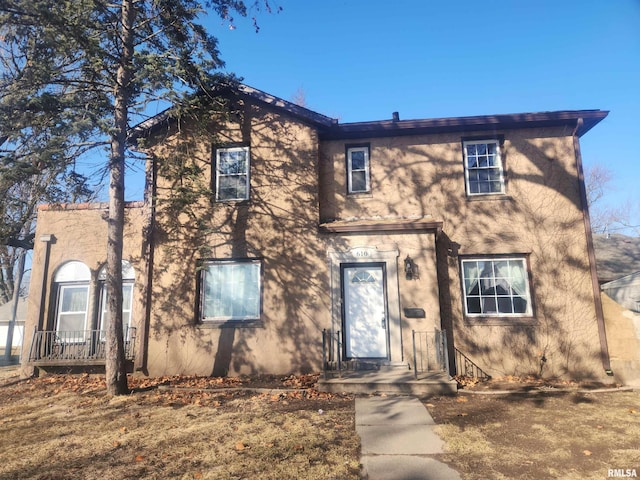 view of front of home featuring stucco siding