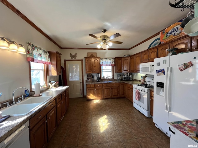 kitchen with crown molding, white appliances, a sink, and ceiling fan