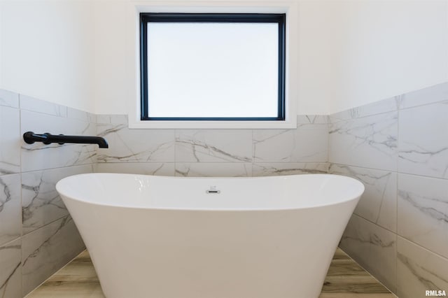 bathroom featuring a freestanding bath