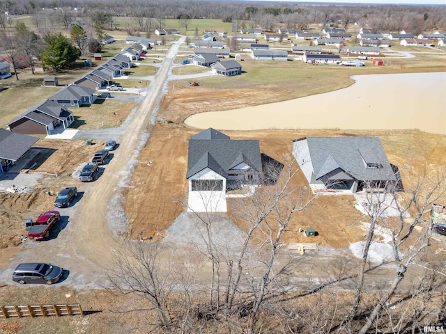 birds eye view of property with a residential view