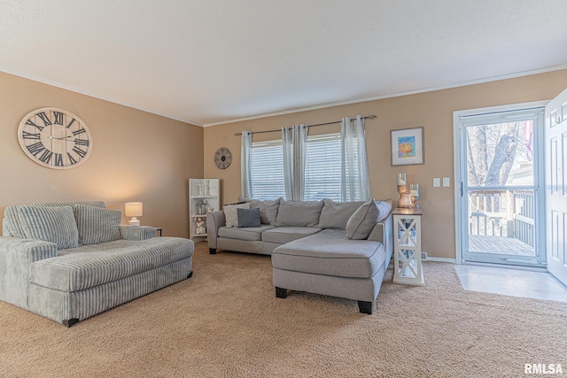 living area featuring crown molding, light colored carpet, and baseboards