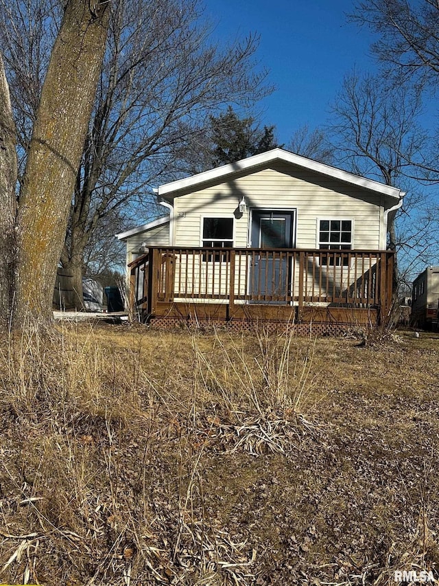 view of front of house featuring a wooden deck