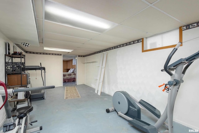 workout area with a drop ceiling