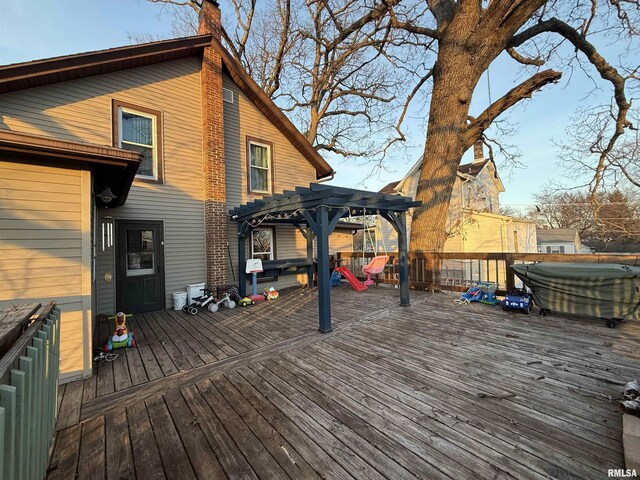 wooden terrace with a pergola