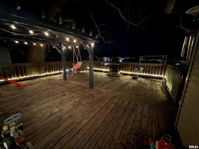 view of deck at twilight