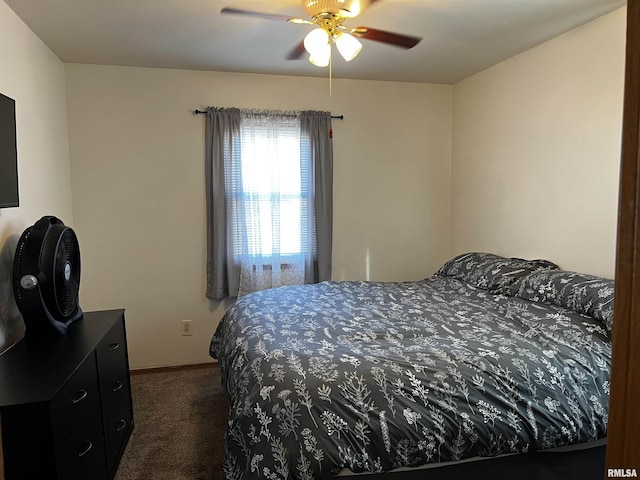 carpeted bedroom featuring a ceiling fan