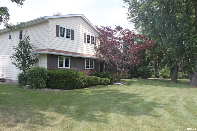 view of property exterior with crawl space and a lawn