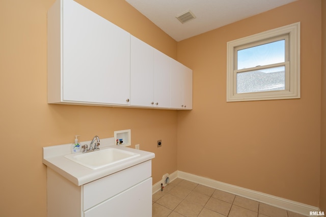 clothes washing area with visible vents, hookup for a washing machine, cabinet space, hookup for an electric dryer, and a sink