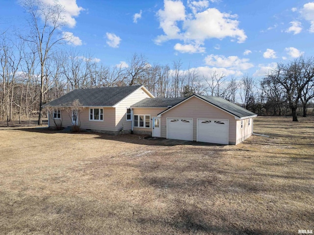 ranch-style house with a shingled roof, a front yard, driveway, and crawl space