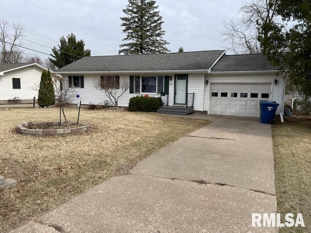 single story home with an attached garage, concrete driveway, and a front yard