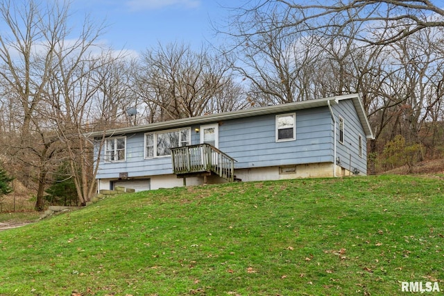 ranch-style home with a front lawn