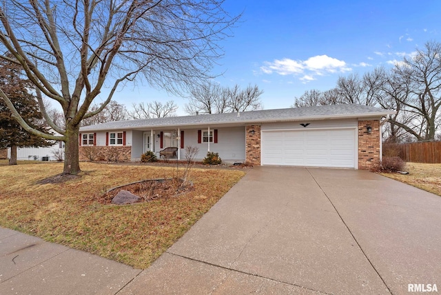 single story home with brick siding, fence, a porch, concrete driveway, and an attached garage